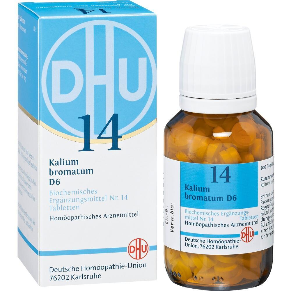 Blaue Medikamentenverpackung und Glasflasche mit weißen Tabletten.